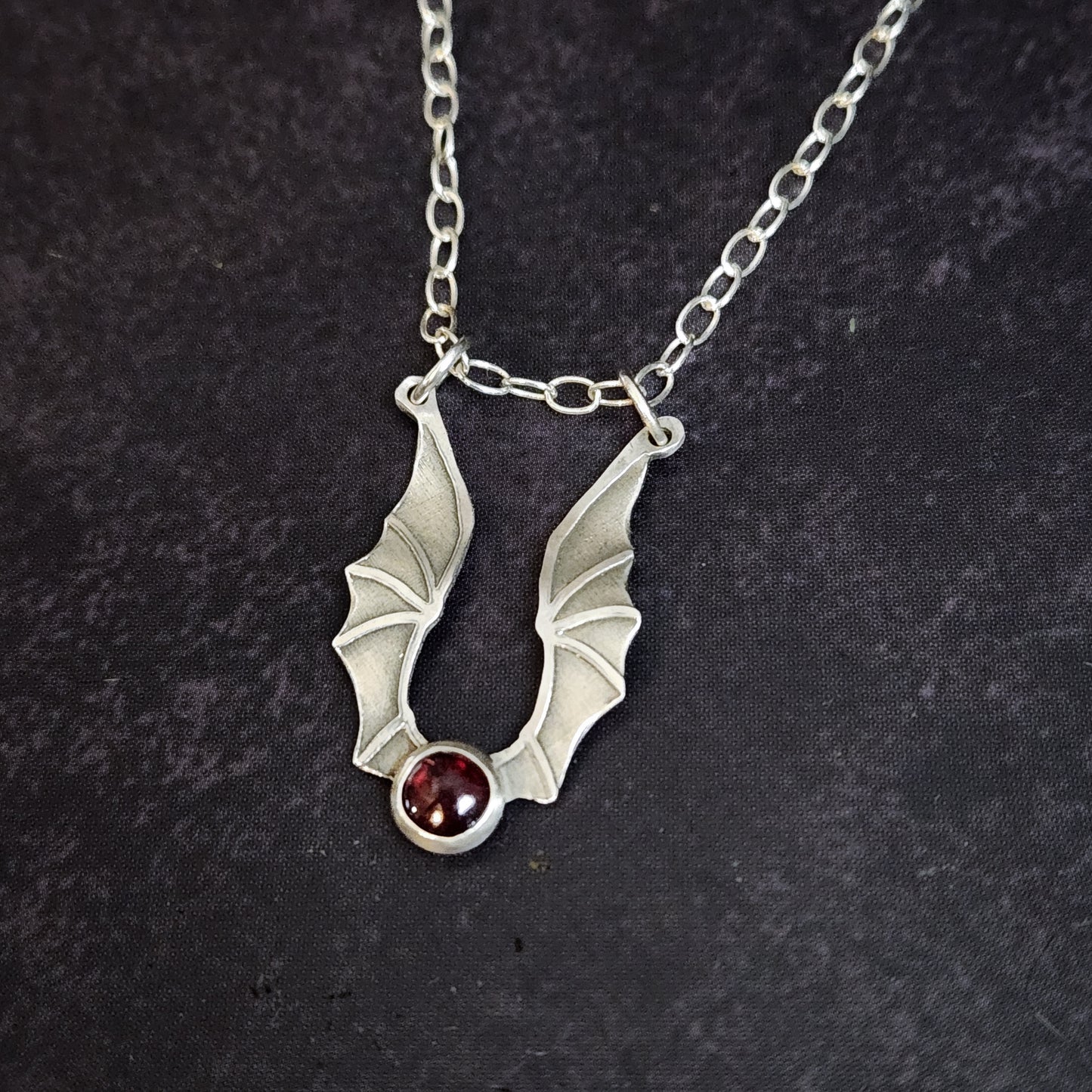 Emberwing Hatchling Pendant – Sterling Silver Mini Dragon Necklace with Garnet