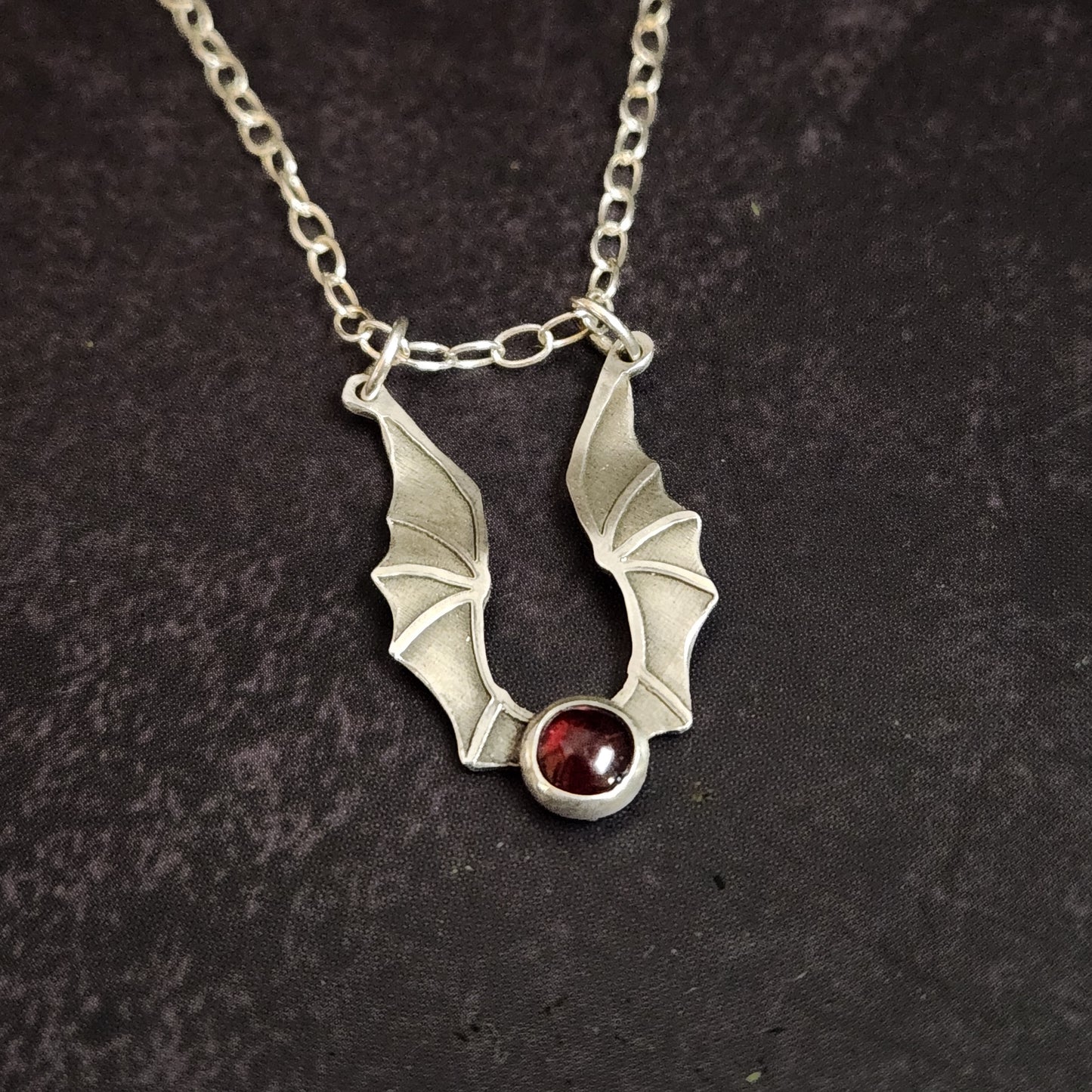 Emberwing Hatchling Pendant – Sterling Silver Mini Dragon Necklace with Garnet